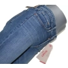 Damskie spodnie jeansowe Levi's 712 -Slim Mid Rise 188840060