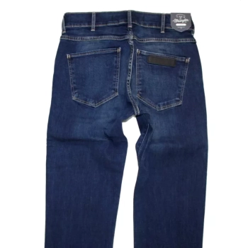 Spodnie jeansowe damskie Wrangler Caitlin - Regular - Scuffed Indigo W24CX134D