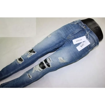 Męskie jeansy Guess -Slim Low M72AS2R2DU0 same dziury